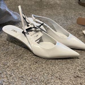 Never worn Zara white heels with tag size 9